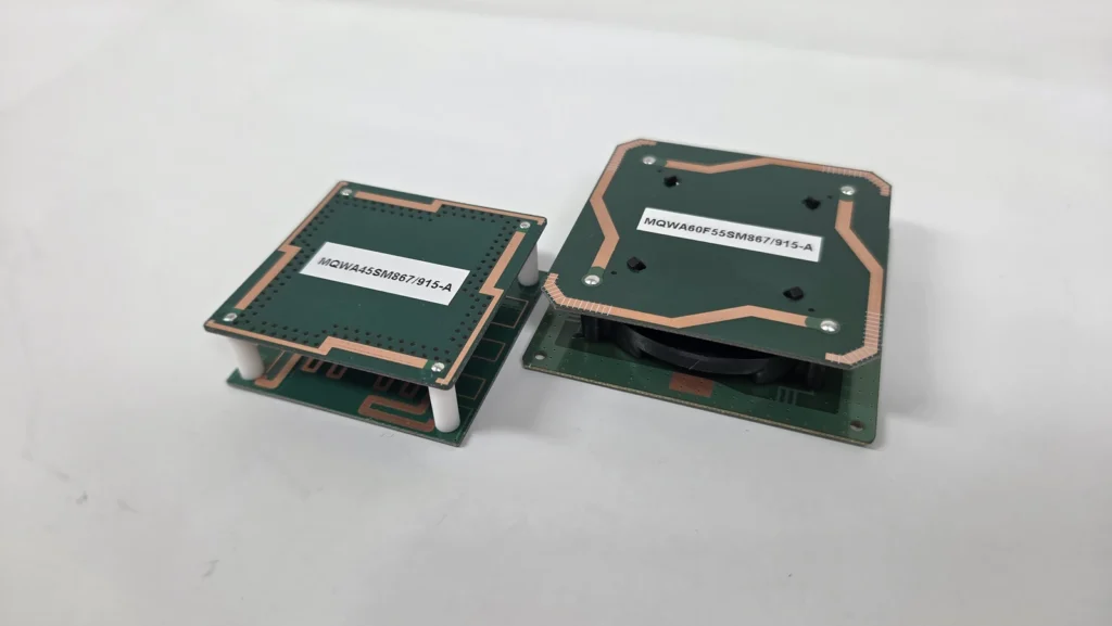 QWA PCB antenna assemblies showing board spacing and model labels