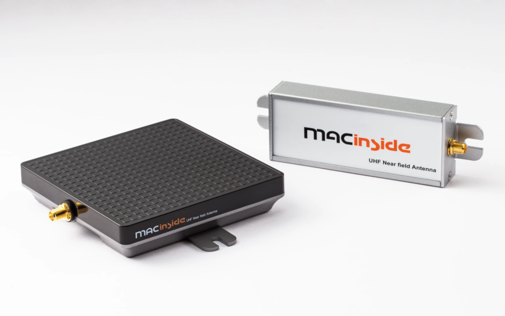 Near-field RFID antenna housings with mounting tabs and RF connectors