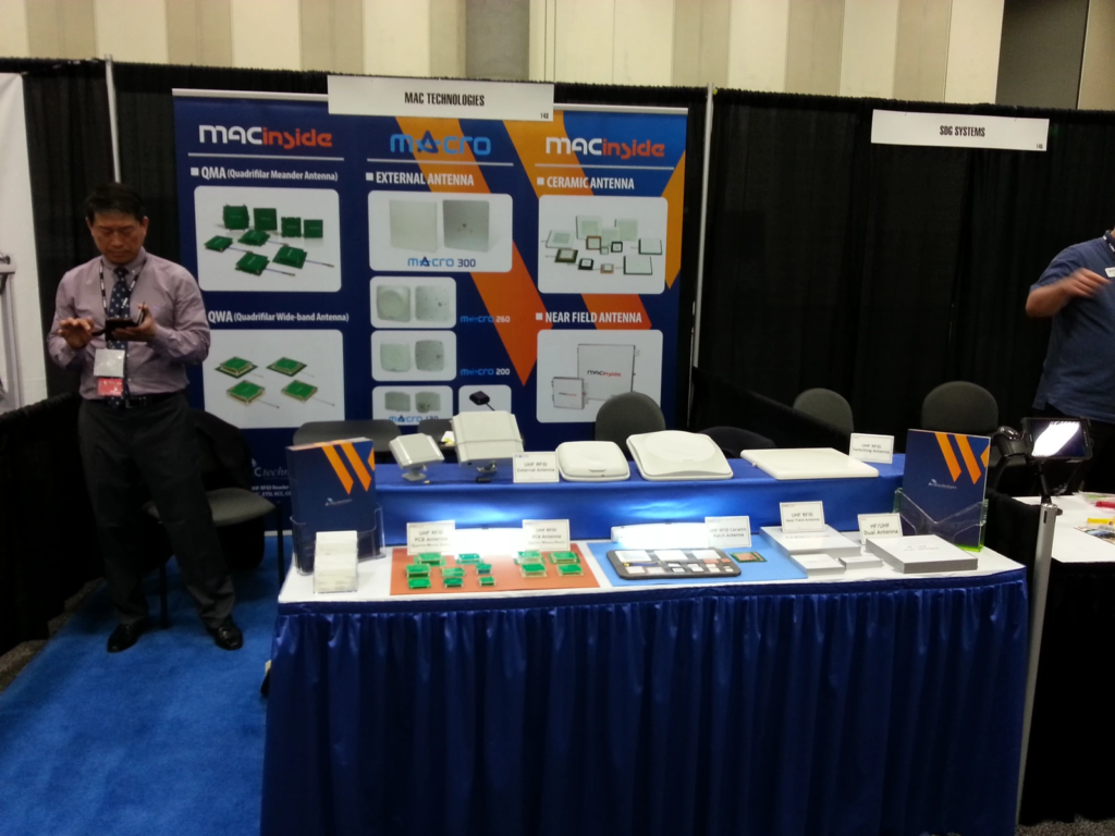 MAC technologies booth with antenna products and technical posters at RFID Journal LIVE 2015