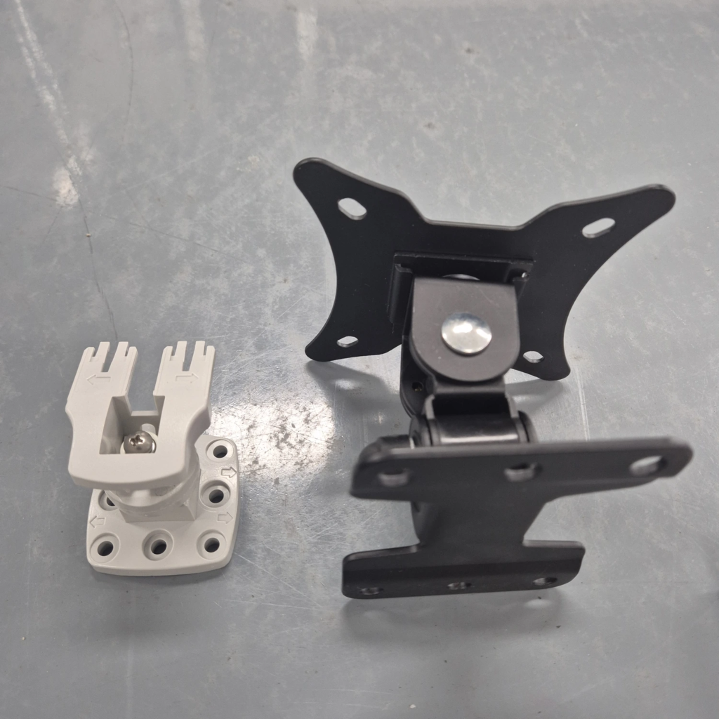 Two antenna mounting brackets viewed from above